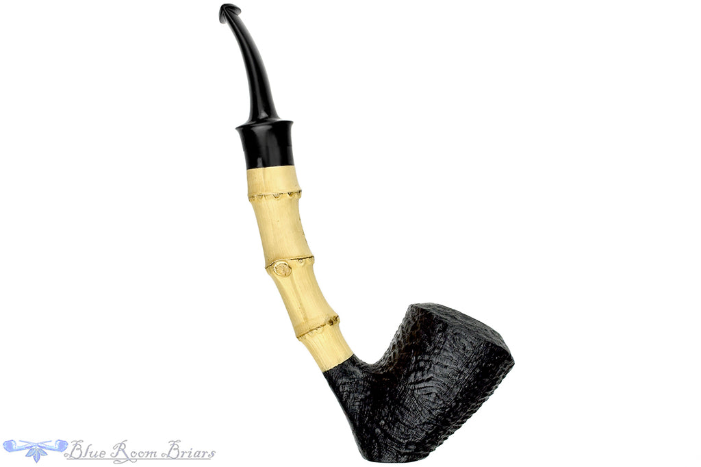Blue Room Briars is proud to present this Dirk Heinemann Pipe Bent Ring Blast Tipsy Cherrywood Sitter with Bamboo