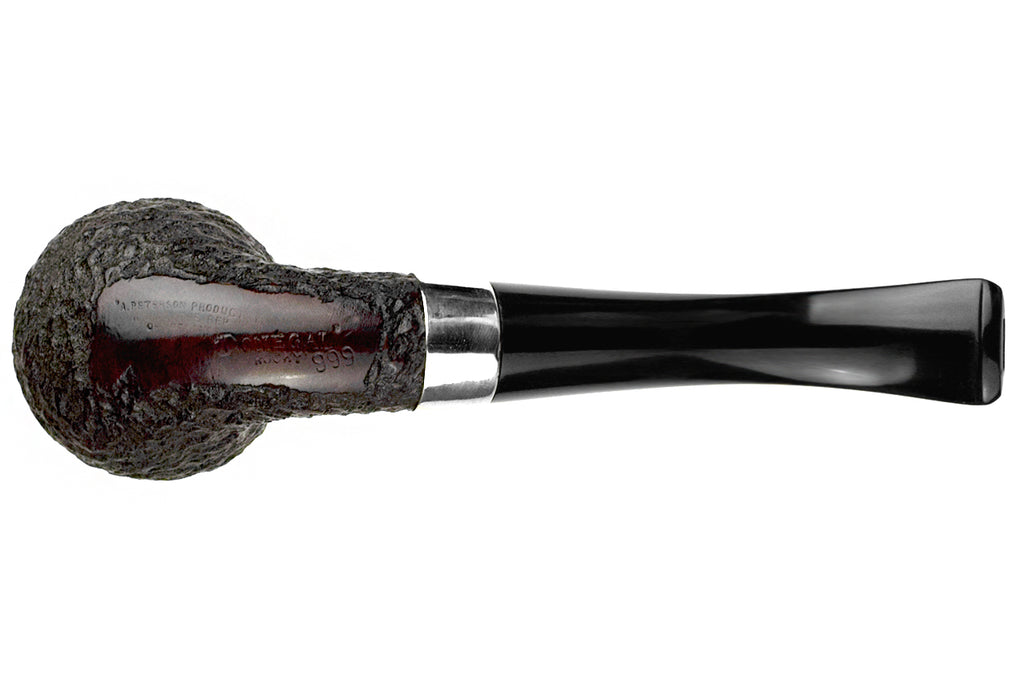 Blue Room Briars is proud to present this Peterson Donegal Rocky 999 Bent Rusticated Rhodesian With Nickel Estate Pipe with Replacement Stem