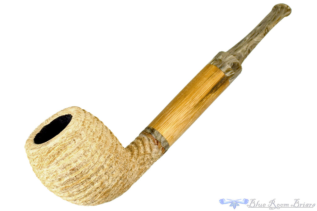 Blue Room Briars is proud to present this Brian Orton Pipe Carved Driftwood Belge with Bamboo