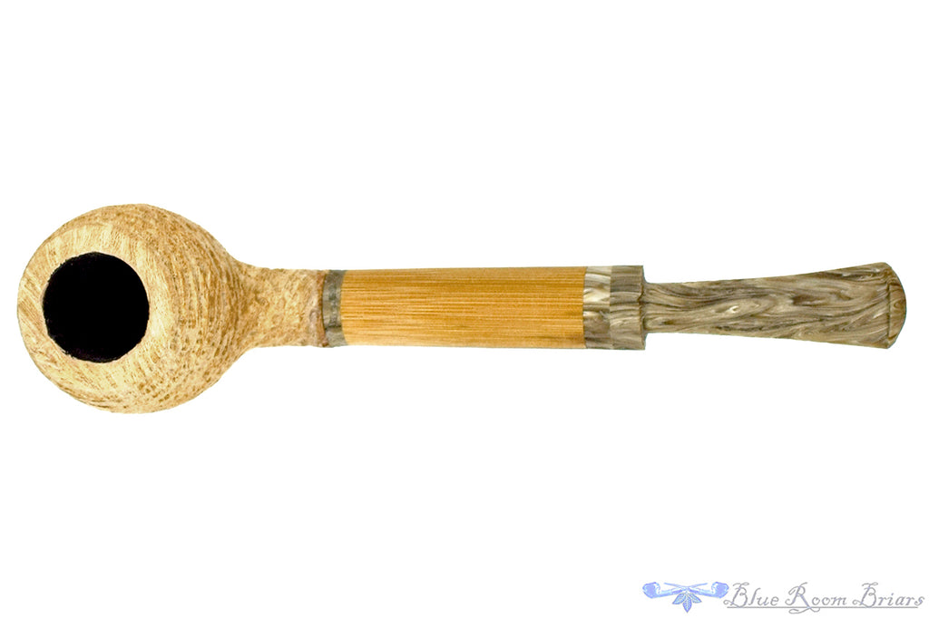 Blue Room Briars is proud to present this Brian Orton Pipe Carved Driftwood Belge with Bamboo