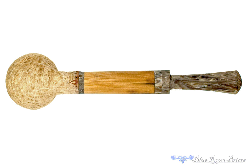 Blue Room Briars is proud to present this Brian Orton Pipe Carved Driftwood Belge with Bamboo