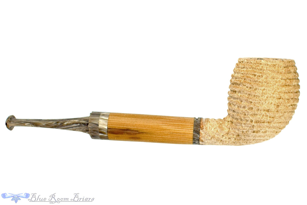 Blue Room Briars is proud to present this Brian Orton Pipe Carved Driftwood Belge with Bamboo