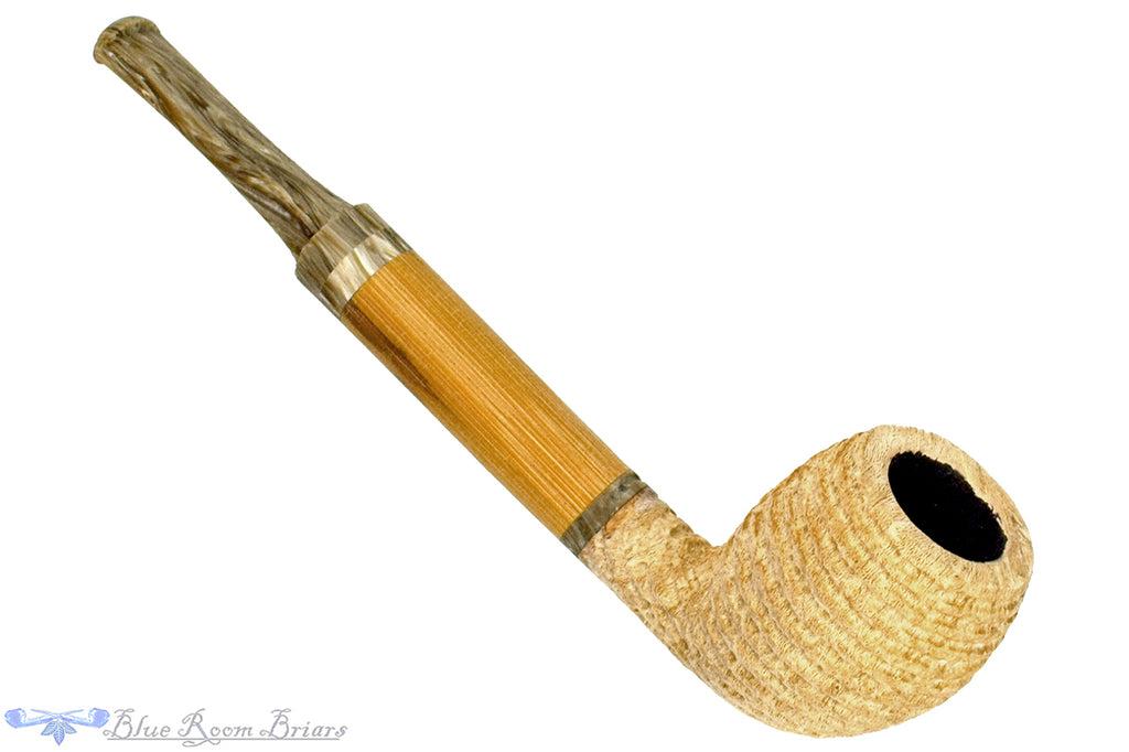 Blue Room Briars is proud to present this Brian Orton Pipe Carved Driftwood Belge with Bamboo