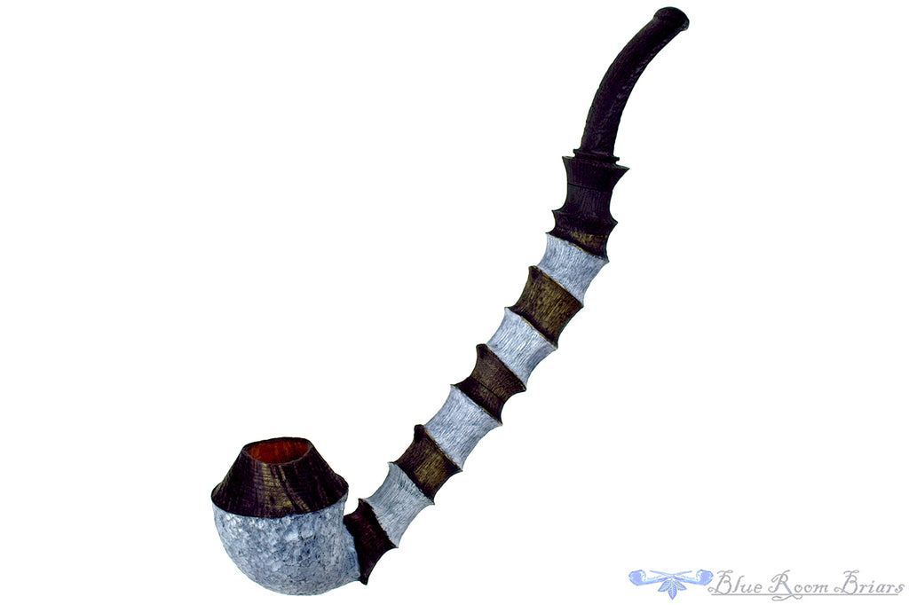 Blue Room Briars is proud to present this Brian Orton Pipe Bent Carved Driftwood Rhodesian with Bamboo and Shank Extension