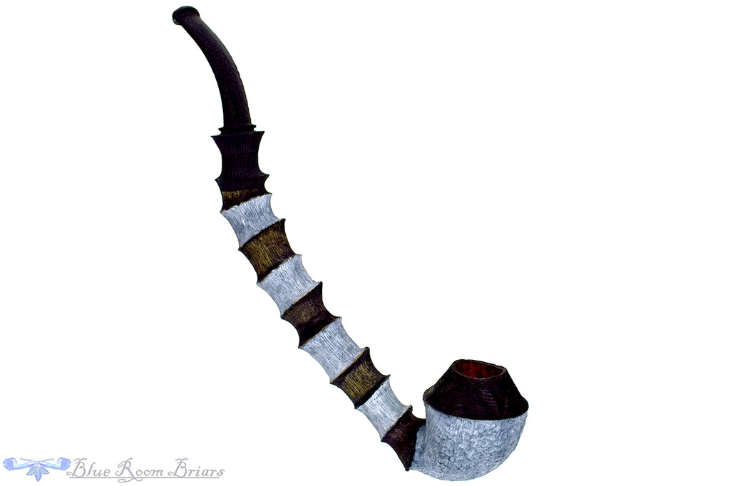 Blue Room Briars is proud to present this Brian Orton Pipe Bent Carved Driftwood Rhodesian with Bamboo and Shank Extension