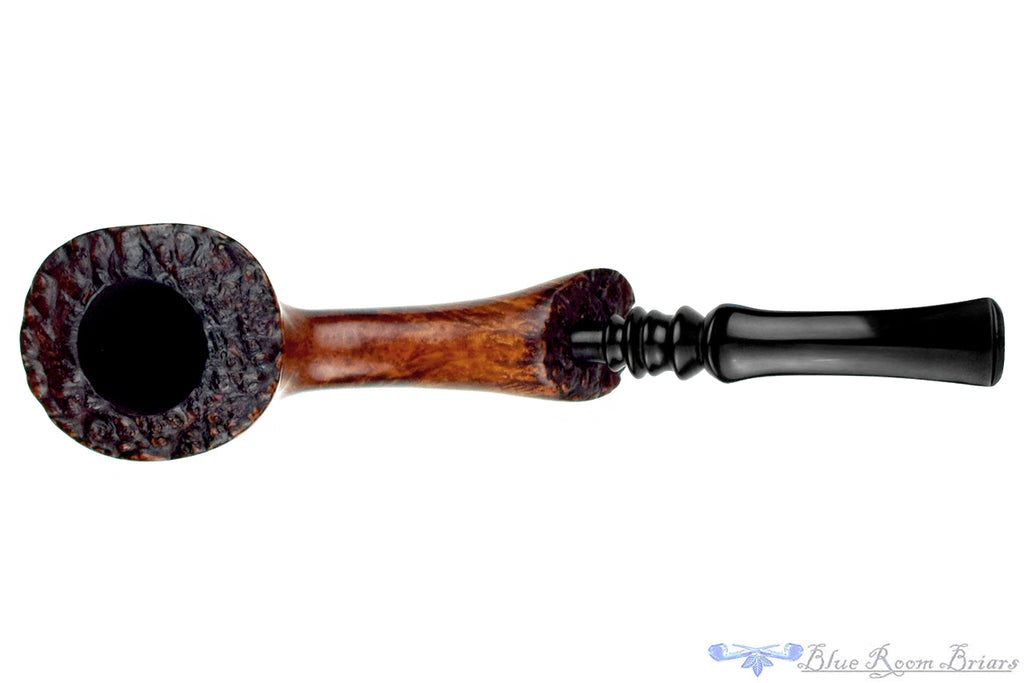 Blue Room Briars is proud to present this Karl Erik Handmade Bent Spot Carved Freehand with Plateaux Estate Pipe