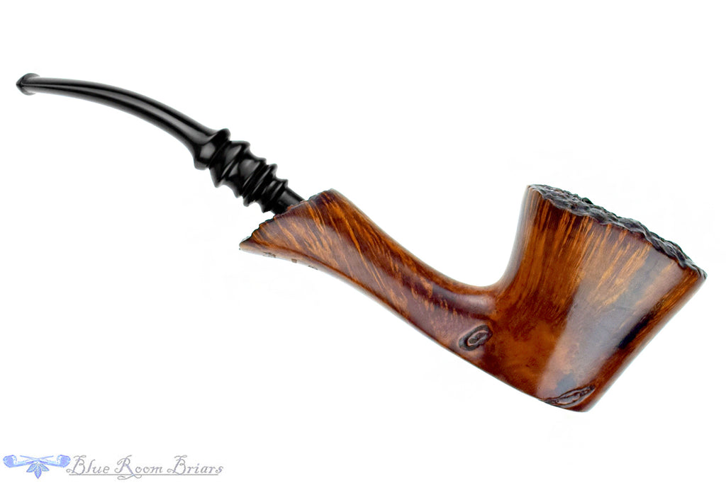 Blue Room Briars is proud to present this Karl Erik Handmade Bent Spot Carved Freehand with Plateaux Estate Pipe
