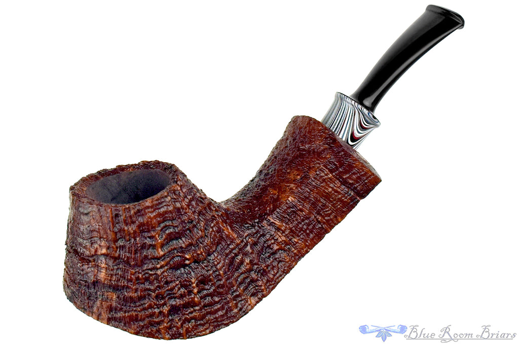 Blue Room Briars is proud to present this Bill Shalosky Pipe 819 Bent Contrast Blast Volcano with Fordite