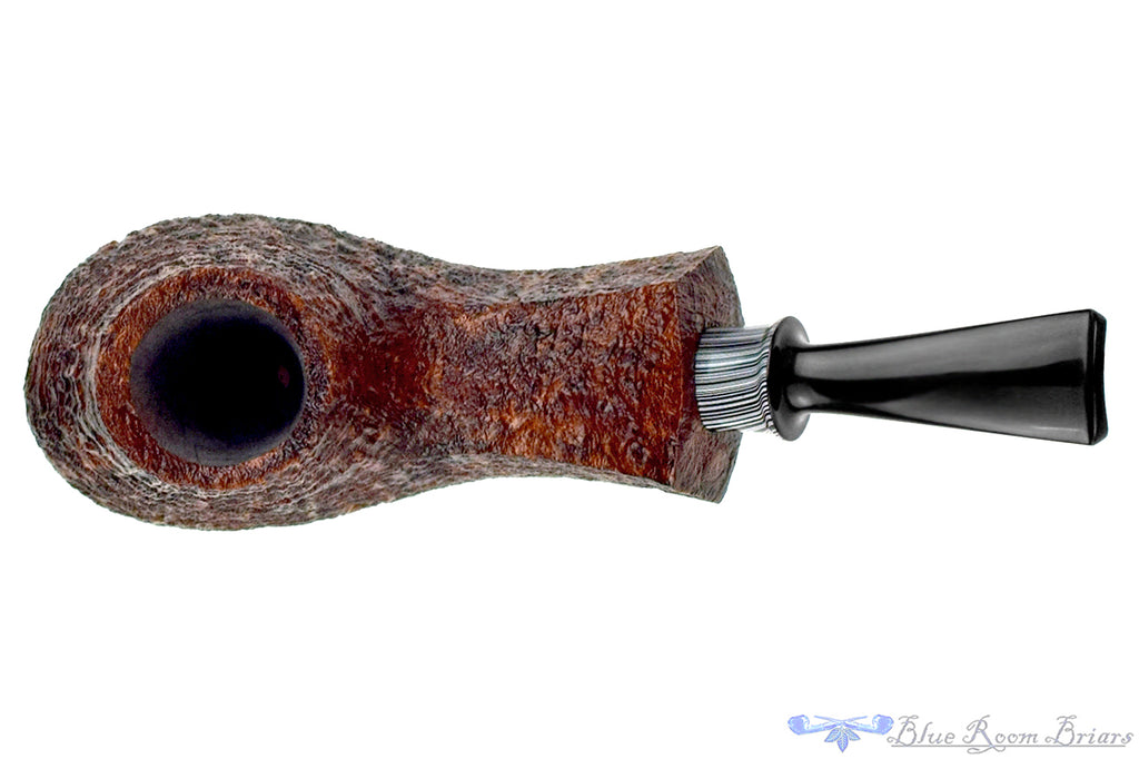Blue Room Briars is proud to present this Bill Shalosky Pipe 819 Bent Contrast Blast Volcano with Fordite