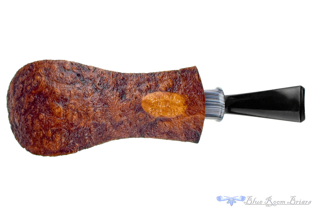 Blue Room Briars is proud to present this Bill Shalosky Pipe 819 Bent Contrast Blast Volcano with Fordite