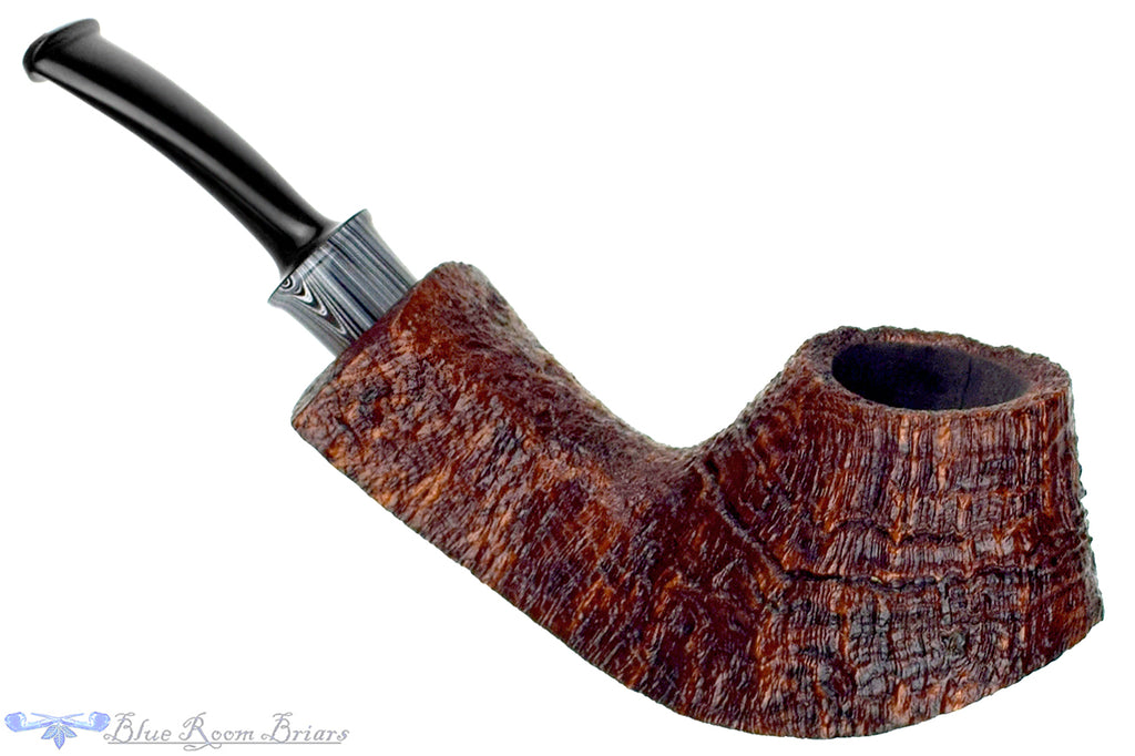 Blue Room Briars is proud to present this Bill Shalosky Pipe 819 Bent Contrast Blast Volcano with Fordite