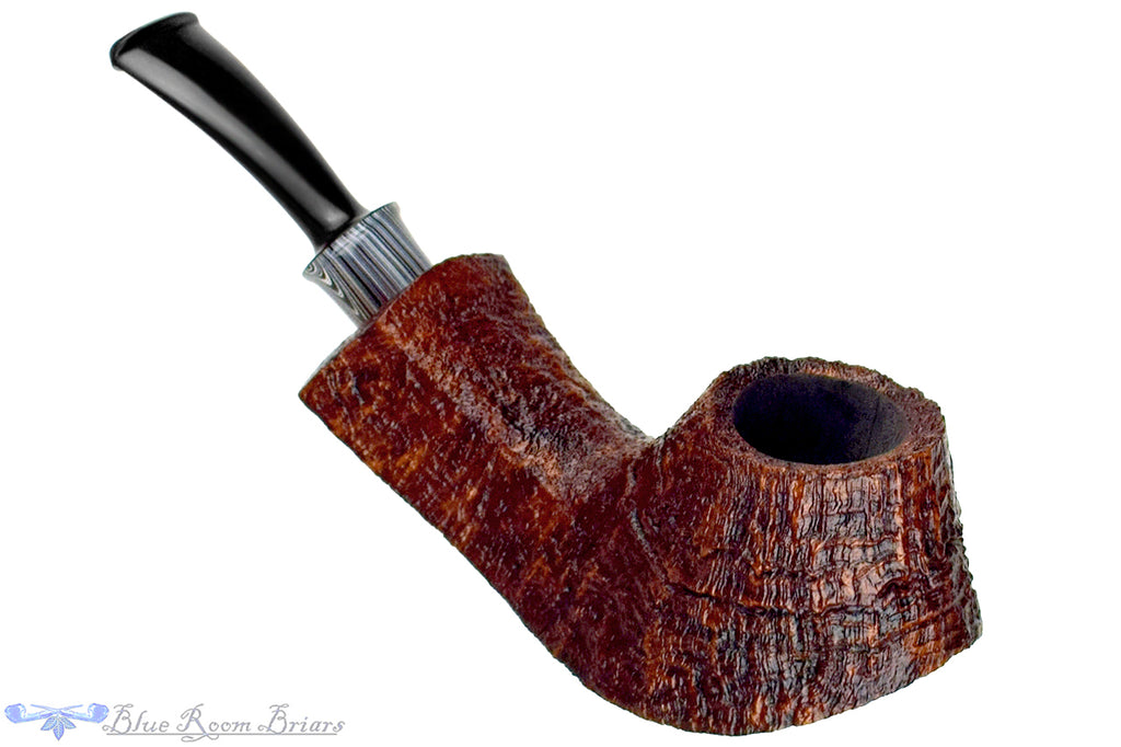 Blue Room Briars is proud to present this Bill Shalosky Pipe 819 Bent Contrast Blast Volcano with Fordite