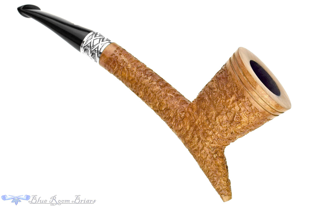 Blue Room Briars is proud to present this Ser Jacopo Calumet Spongia Rusticated with Silver Estate Pipe