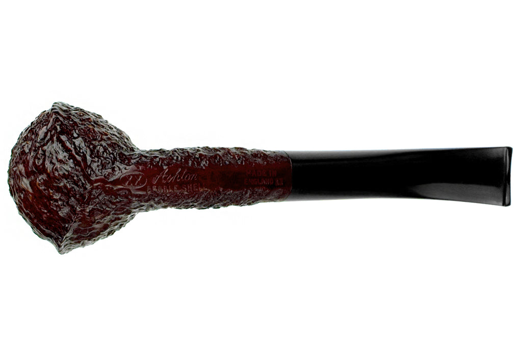 Blue Room Briar is proud to present this Ashton Pebble Shell (1994 Make) XX Bent Tri-Corner Estate Pipe