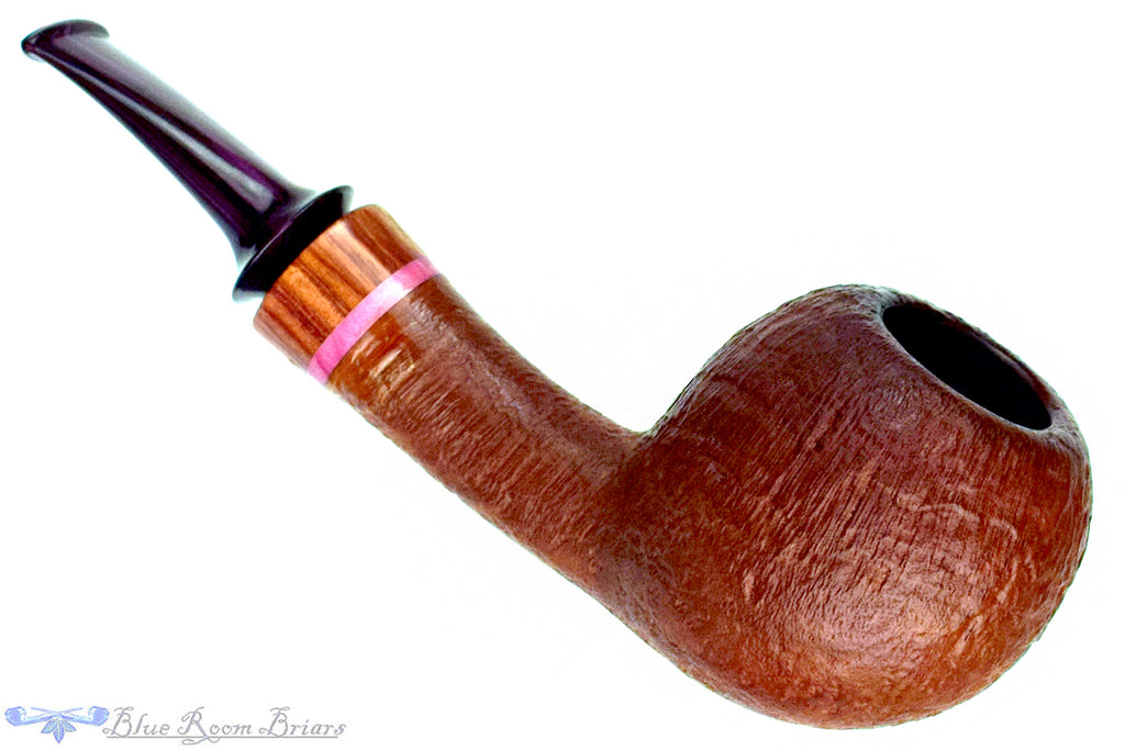 Blue Room Briar is proud to present this Tom Richard Tan Blast Apple with Rosewood and Purple Brindle Estate Pipe