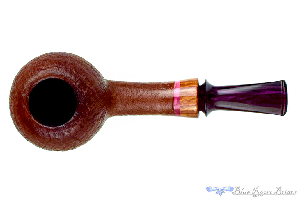 Blue Room Briar is proud to present this Tom Richard Tan Blast Apple with Rosewood and Purple Brindle Estate Pipe