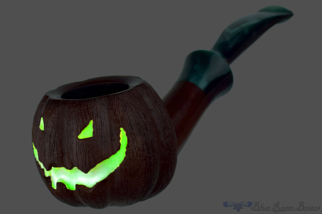 Blue Room Briars is proud to present this Blue Room Briars Pipe 2025 Halloween Bent Carved Glow in the Dark Jack-O'-Lantern