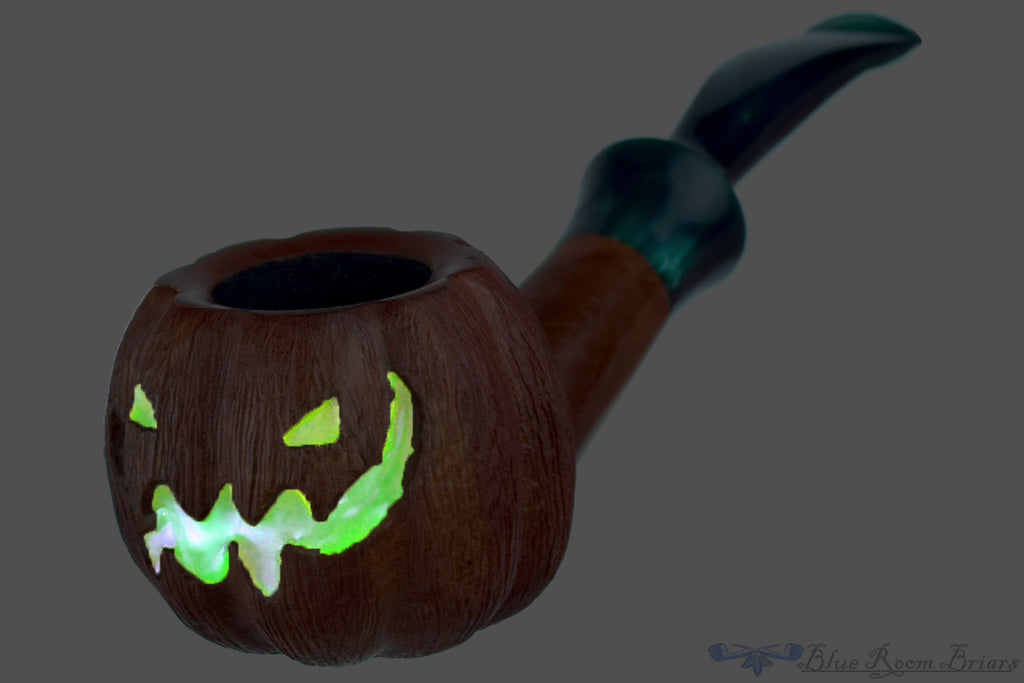 Blue Room Briars is proud to present this Blue Room Briars Pipe 2025 Halloween Bent Carved Glow in the Dark Jack-O'-Lantern