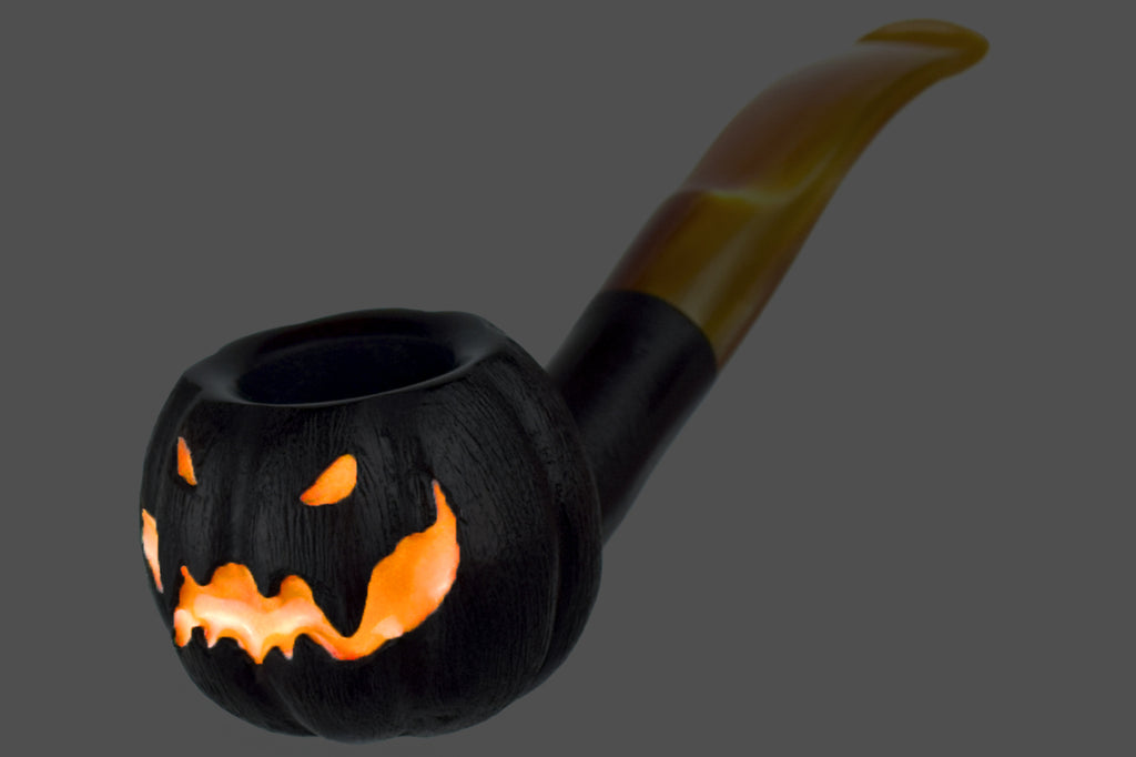 Blue Room Briars is proud to present this Blue Room Briars Pipe 2025 Halloween Bent Carved Glow in the Dark Jack-O'-Lantern