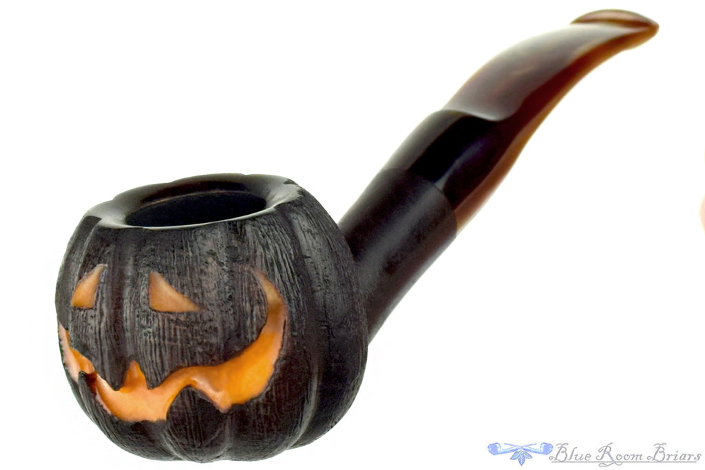 Blue Room Briars is proud to present this Blue Room Briars Pipe 2025 Halloween Bent Carved Glow in the Dark Jack-O'-Lantern