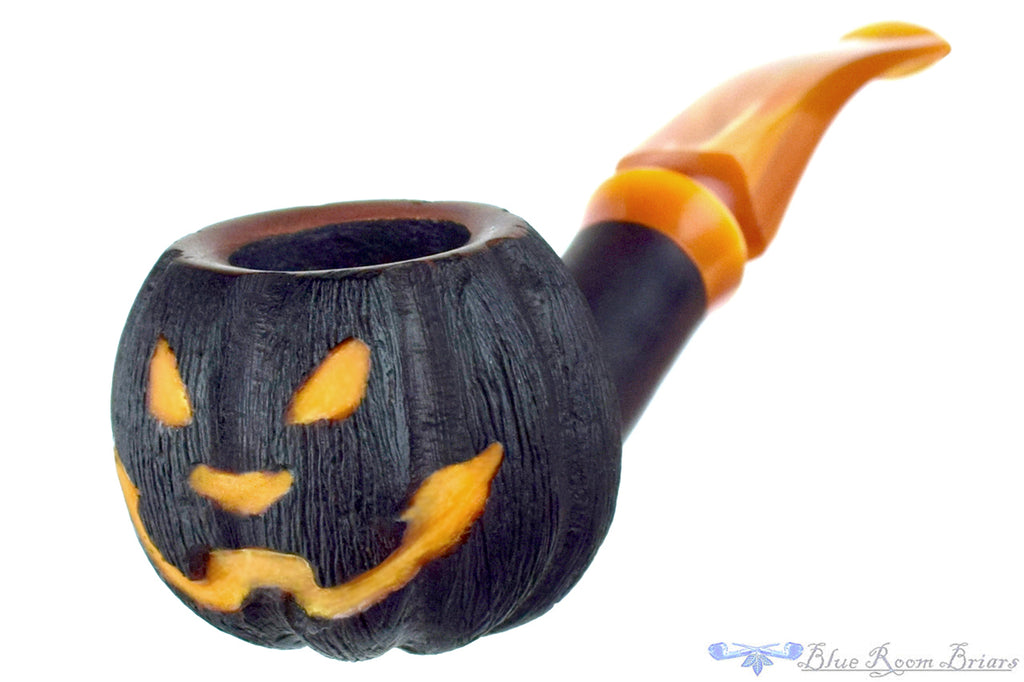 Blue Room Briars is proud to present this Blue Room Briars Pipe 2025 Halloween Bent Carved Glow in the Dark Jack-O'-Lantern
