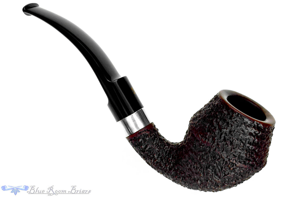 Blue Room Briars is proud to present this Radice Rind Rusticated Bent Rhodesian with Silver Estate Pipe