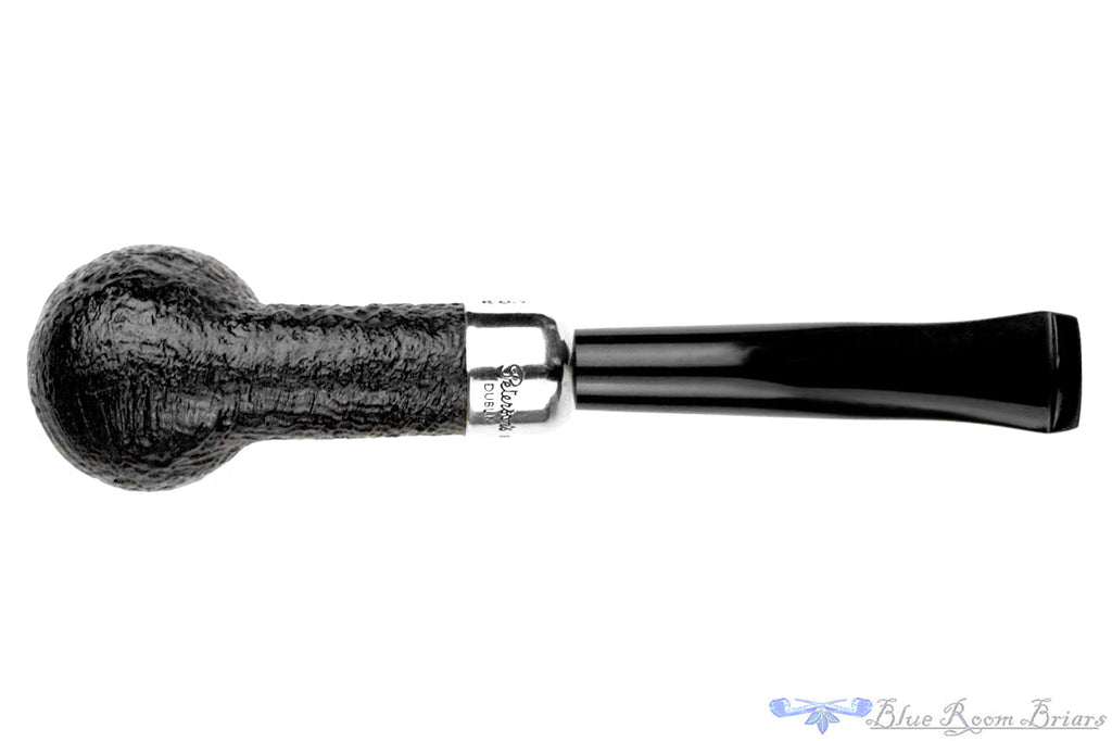 Blue Room Briars is proud to present this Peterson C.A.P.S. 2002 Pipe Of The Year Sandblast Tall Billiard with Silver and Military Mount Estate Pipe