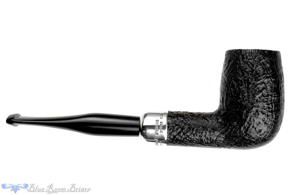 Blue Room Briars is proud to present this Peterson C.A.P.S. 2002 Pipe Of The Year Sandblast Tall Billiard with Silver and Military Mount Estate Pipe