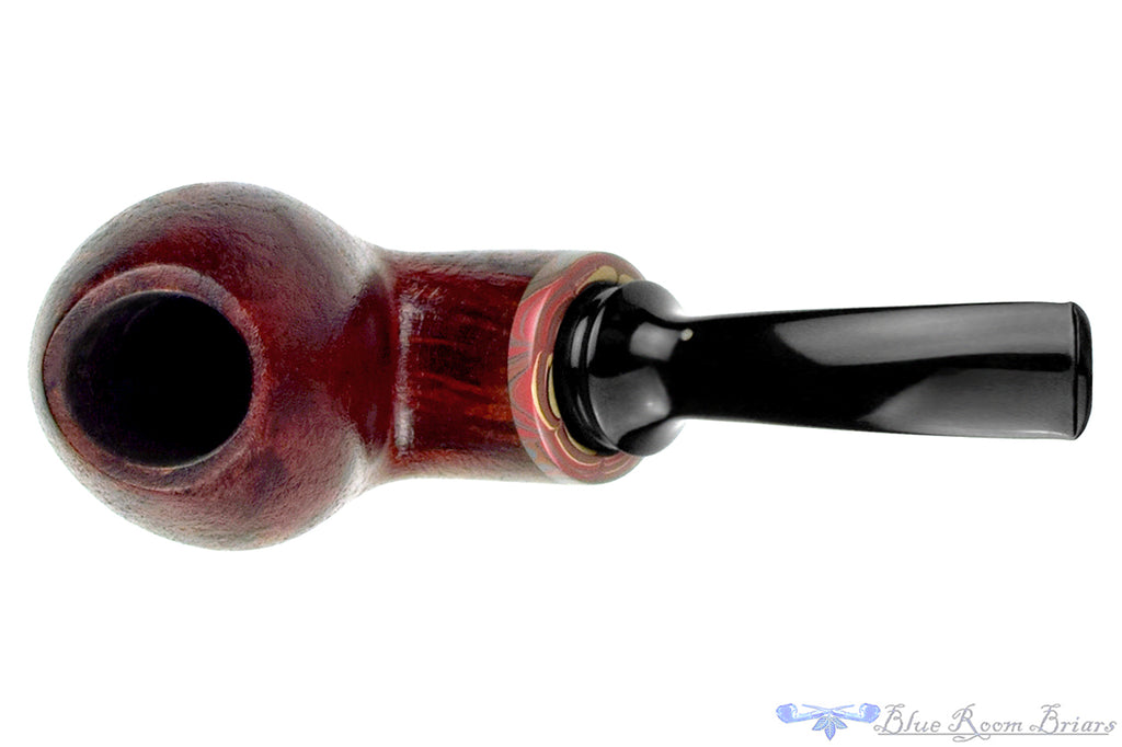 Blue Room Briars is proud to present this Chris Morgan Pipe Bent Satin Blast Reverse Calabash with Brindle