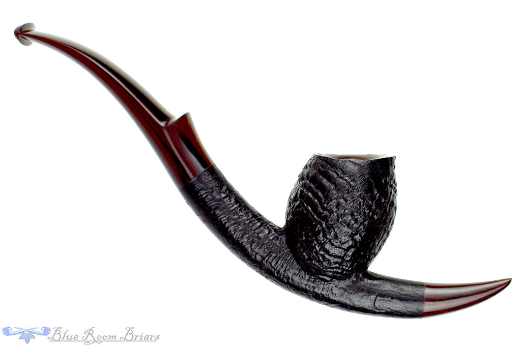 Blue Room Briars is proud to present this Jesse Jones 2025 Halloween Pipe Large Bent Sandblast Cavalier with Brindle