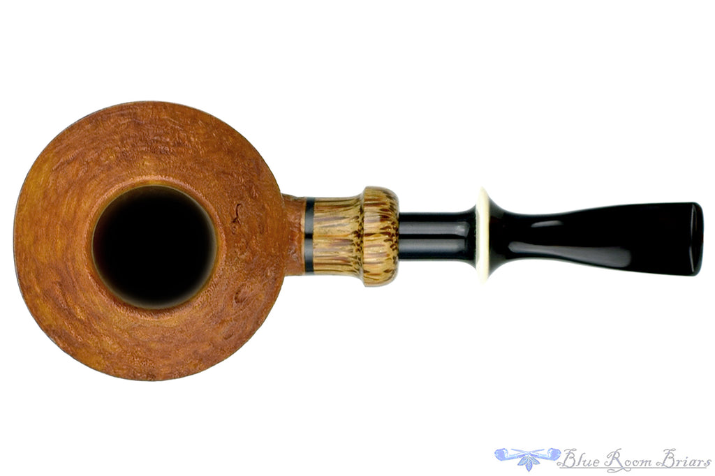 Blue Room Briars is proud to present this Ron Powell Pipe 1/8 Bent Sandblast Rhodesian Sitter with Red Palm Ferrule and Ivorite Stem Insert