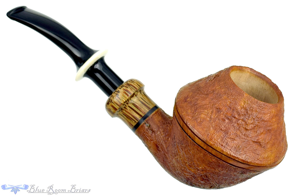 Blue Room Briars is proud to present this Ron Powell Pipe 1/8 Bent Sandblast Rhodesian Sitter with Red Palm Ferrule and Ivorite Stem Insert