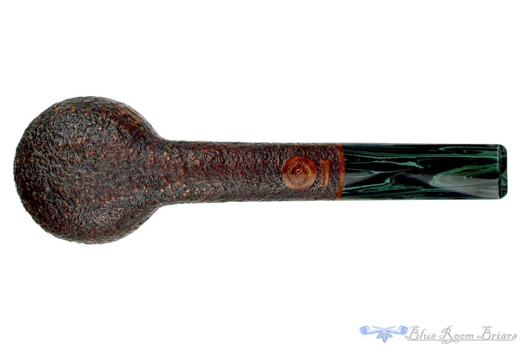 Blue Room Briars is proud to present this Bill Walther Pipe Bent Sandblast Oval Shank Cognac with Green Brindle
