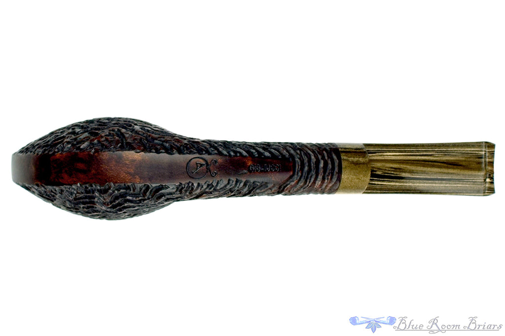 Blue Room Briars is proud to present this Andrea Gigliucci Pipe Bent Carved Black Dublin with Brindle