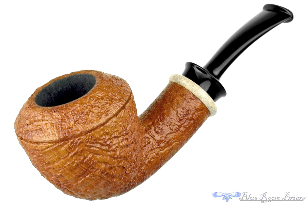 Blue Room Briars is proud to present this Bill Shalosky 619 Bent Tan Blast Rhodesian with Camel Bone