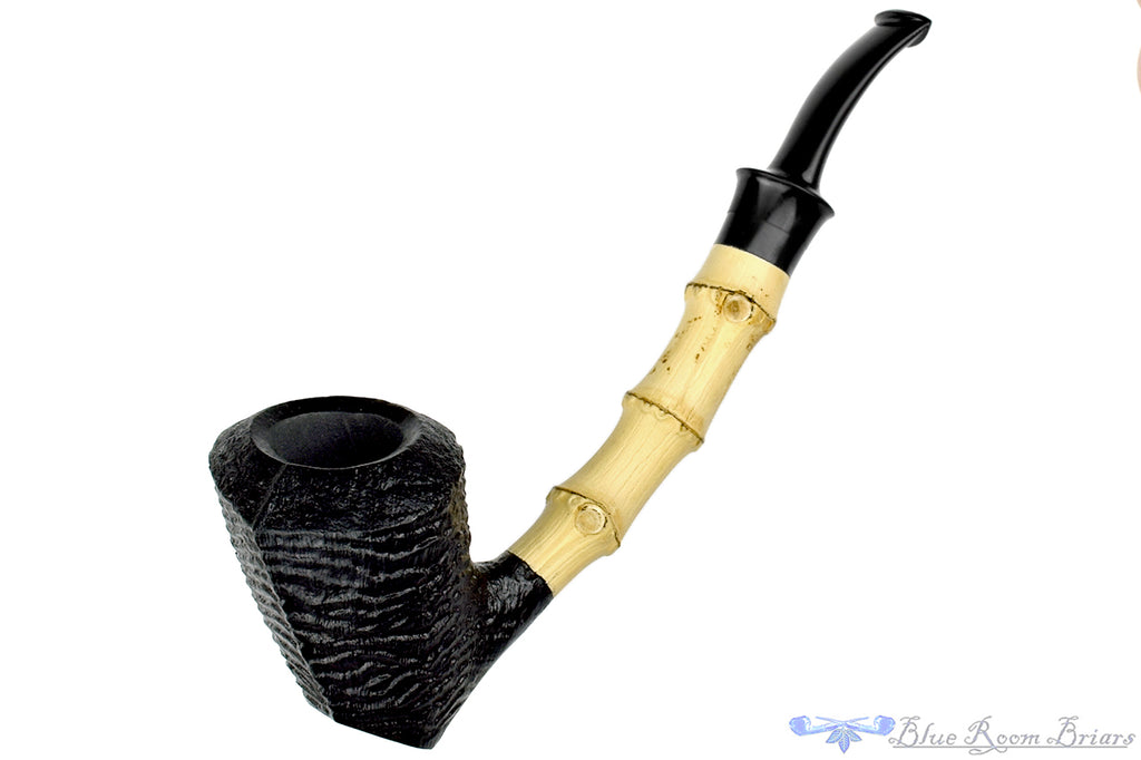 Blue Room Briars is proud to present this Dirk Heinemann Pipe Bent Ring Blast Tipsy Cherrywood Sitter with Bamboo