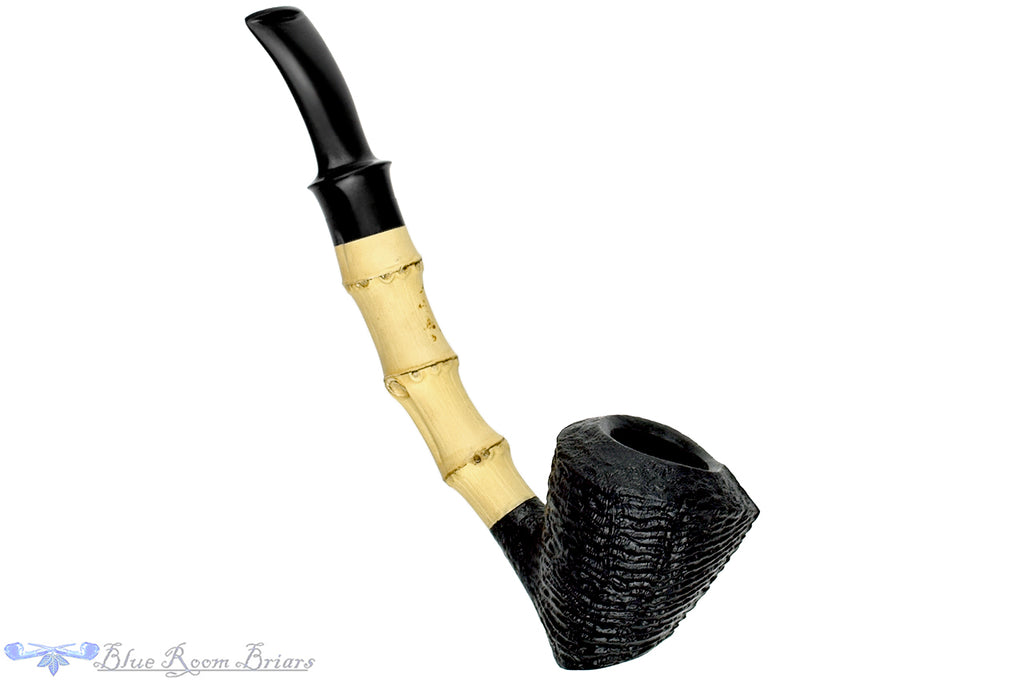 Blue Room Briars is proud to present this Dirk Heinemann Pipe Bent Ring Blast Tipsy Cherrywood Sitter with Bamboo