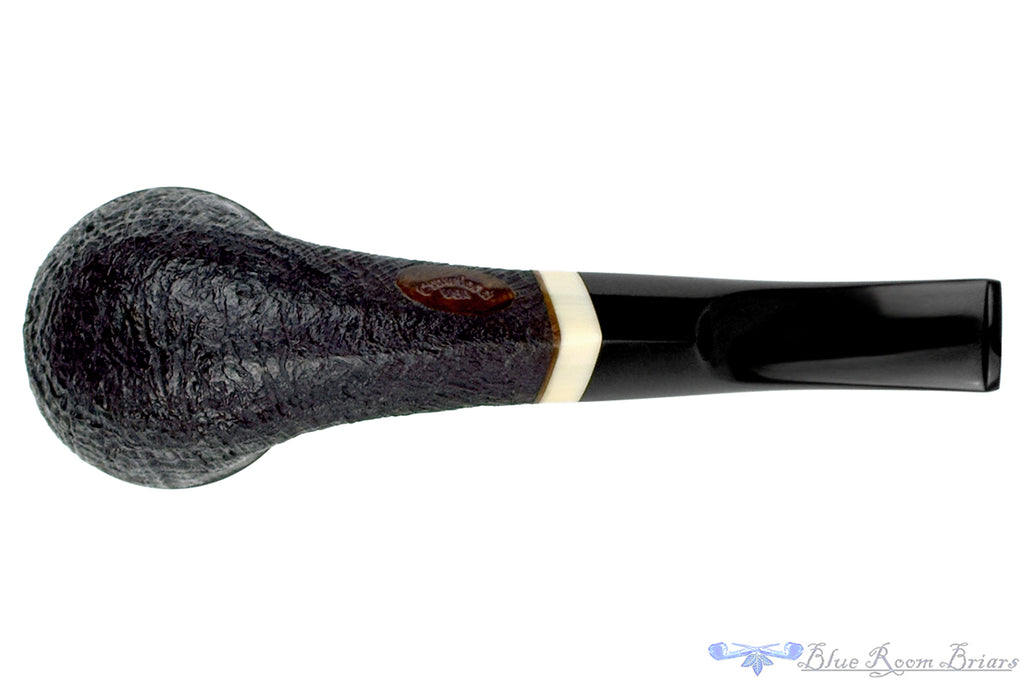 Blue Room Briars is proud to present this Jerry Crawford Pipe Bent Partial Blast Bulldog with Ivorite