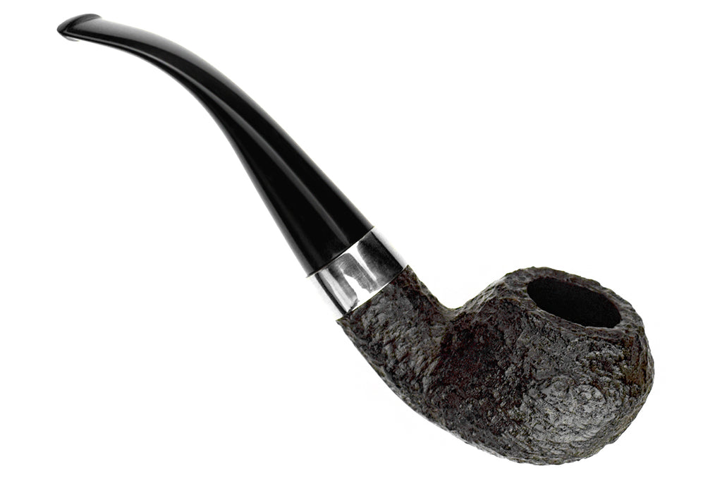 Blue Room Briars is proud to present this Peterson Donegal Rocky 999 Bent Rusticated Rhodesian With Nickel Estate Pipe with Replacement Stem