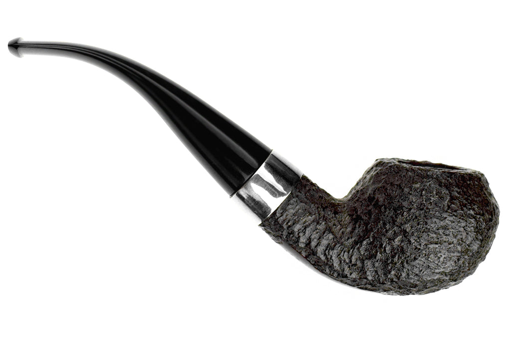 Blue Room Briars is proud to present this Peterson Donegal Rocky 999 Bent Rusticated Rhodesian With Nickel Estate Pipe with Replacement Stem