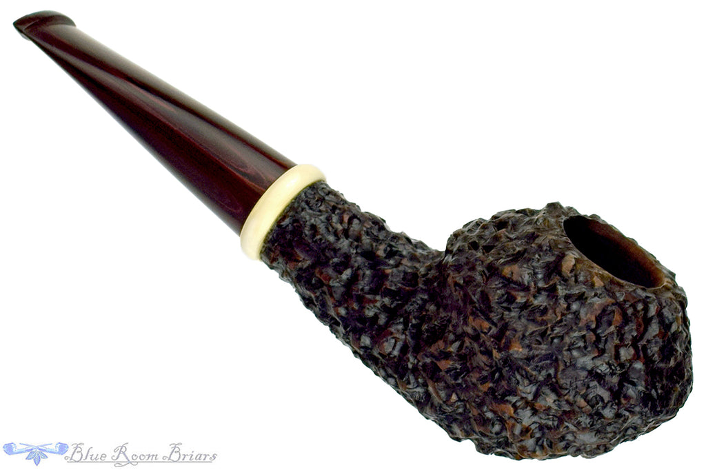 Blue Room Briars is proud to present this Jan Pietenpauw Rusticated Rhodesian Sitter with Warthog Tusk and Brindle Twin Bore Stem Estate Pipe