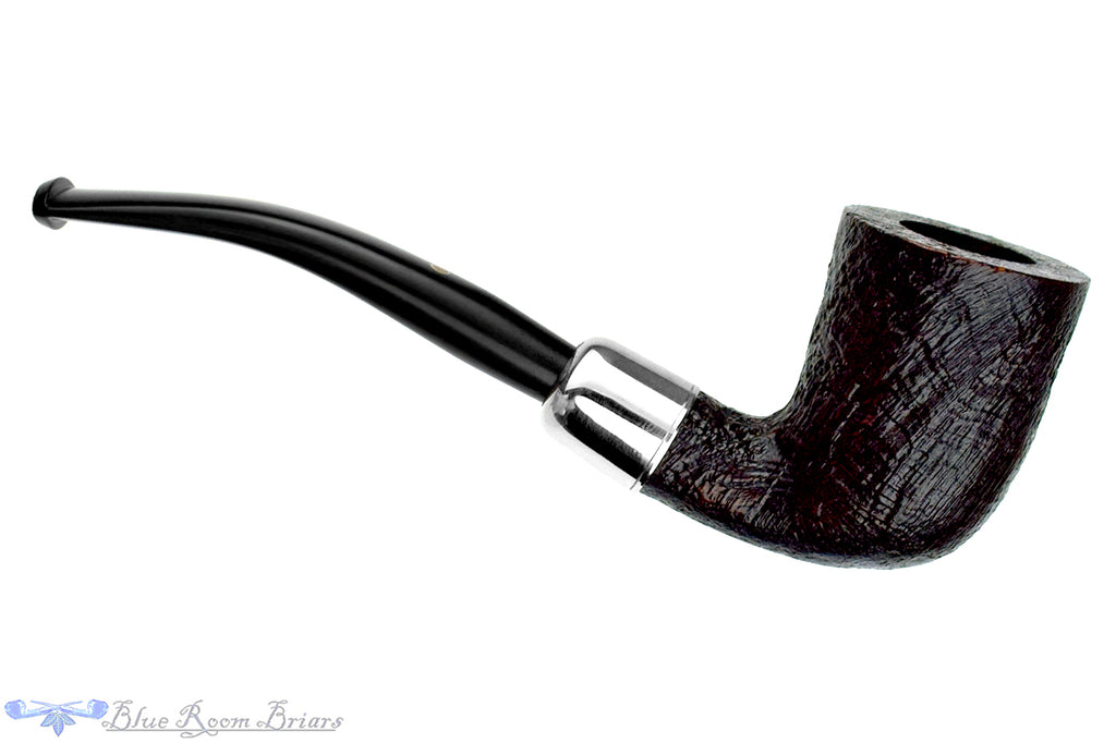 Blue Room Briars is proud to present this Ashton Pebble Grain XX Bent Sandblast Dublin with Silver and Military Mount UNSMOKED Estate Pipe