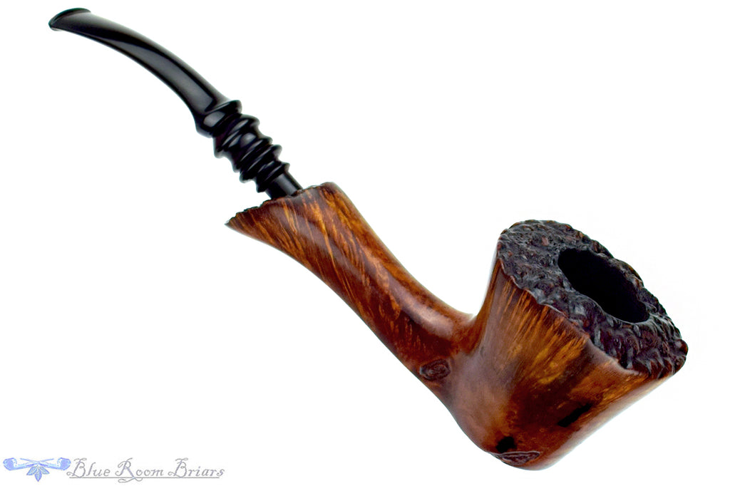 Blue Room Briars is proud to present this Karl Erik Handmade Bent Spot Carved Freehand with Plateaux Estate Pipe