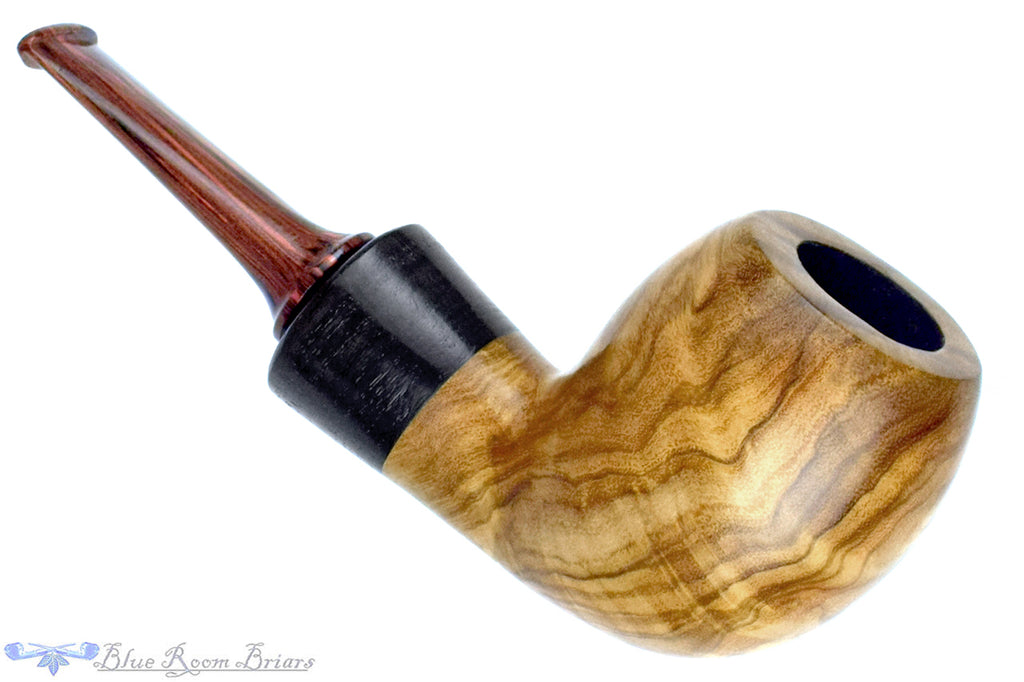 Blue Room Briars is proud to present this Tom Richard Pipe Olivewood Pear with Morta