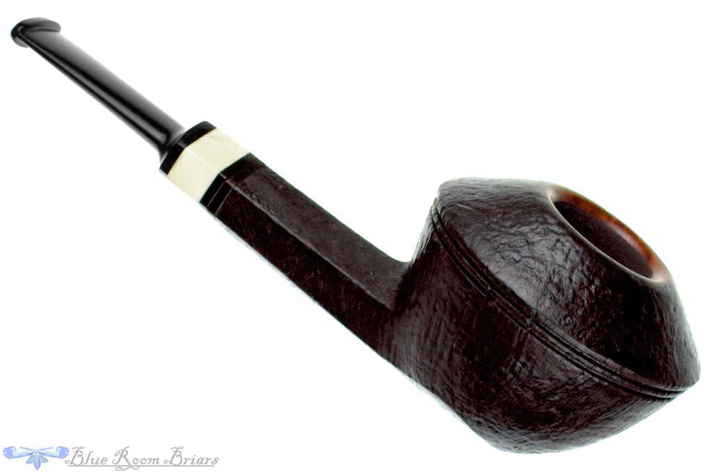 Blue Room Briars is proud to present this Charl Goussard Pipe Sandblast Panel Bullcap with Ivorite