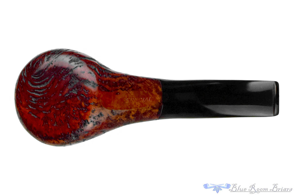 Blue Room Briars is proud to present this Special Bent Sandblast Volcano Sitter with Oval Shank Estate Pipe