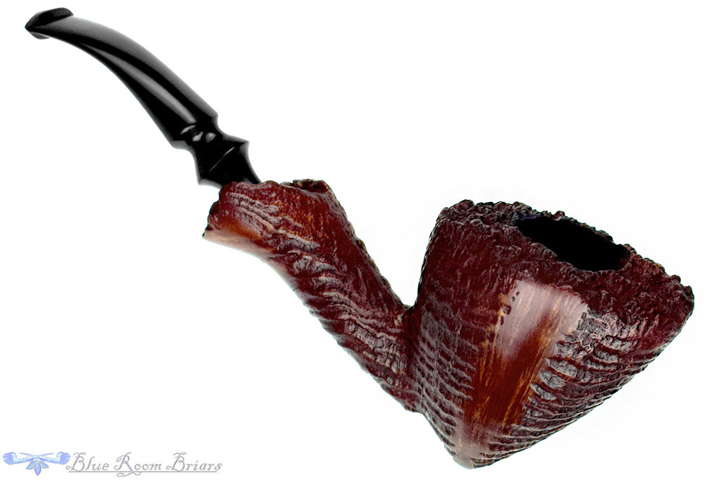 Blue Room Briars is proud to present this Nørding Handcrafted 3 Bent Partial Blast Freehand with Plateaux Estate Pipe