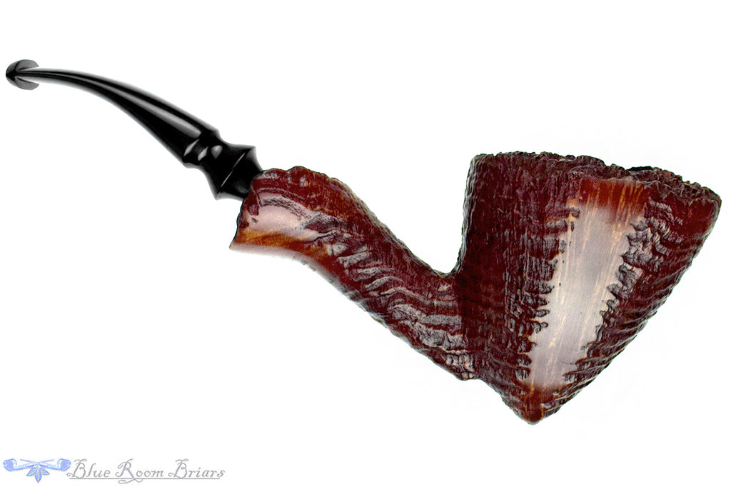 Blue Room Briars is proud to present this Nørding Handcrafted 3 Bent Partial Blast Freehand with Plateaux Estate Pipe