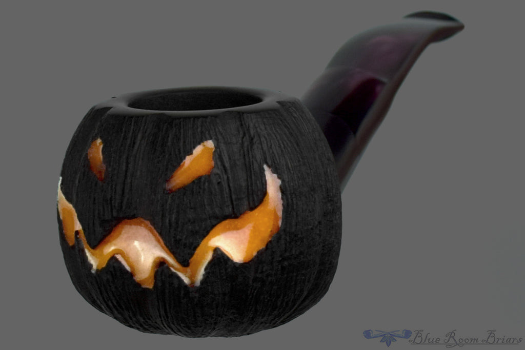 Blue Room Briars is proud to present this Blue Room Briars Pipe 2026 Halloween Bent Carved Glow in the Dark Jack-O'-Lantern