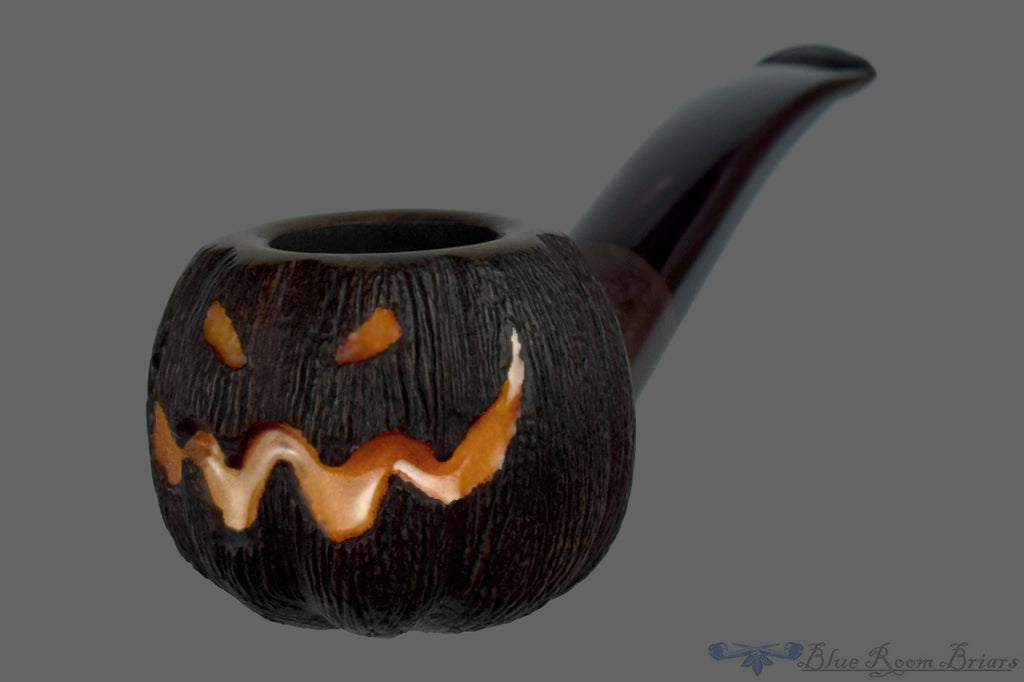 Blue Room Briars is proud to present this Blue Room Briars Pipe 2026 Halloween Bent Carved Glow in the Dark Jack-O'-Lantern